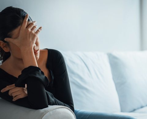 Depressed young Asian woman with mental health problem in mind need uttermost treatment from overthinking fatigue, disruptive thought, dissocial, anxiety and other mental health disorders .